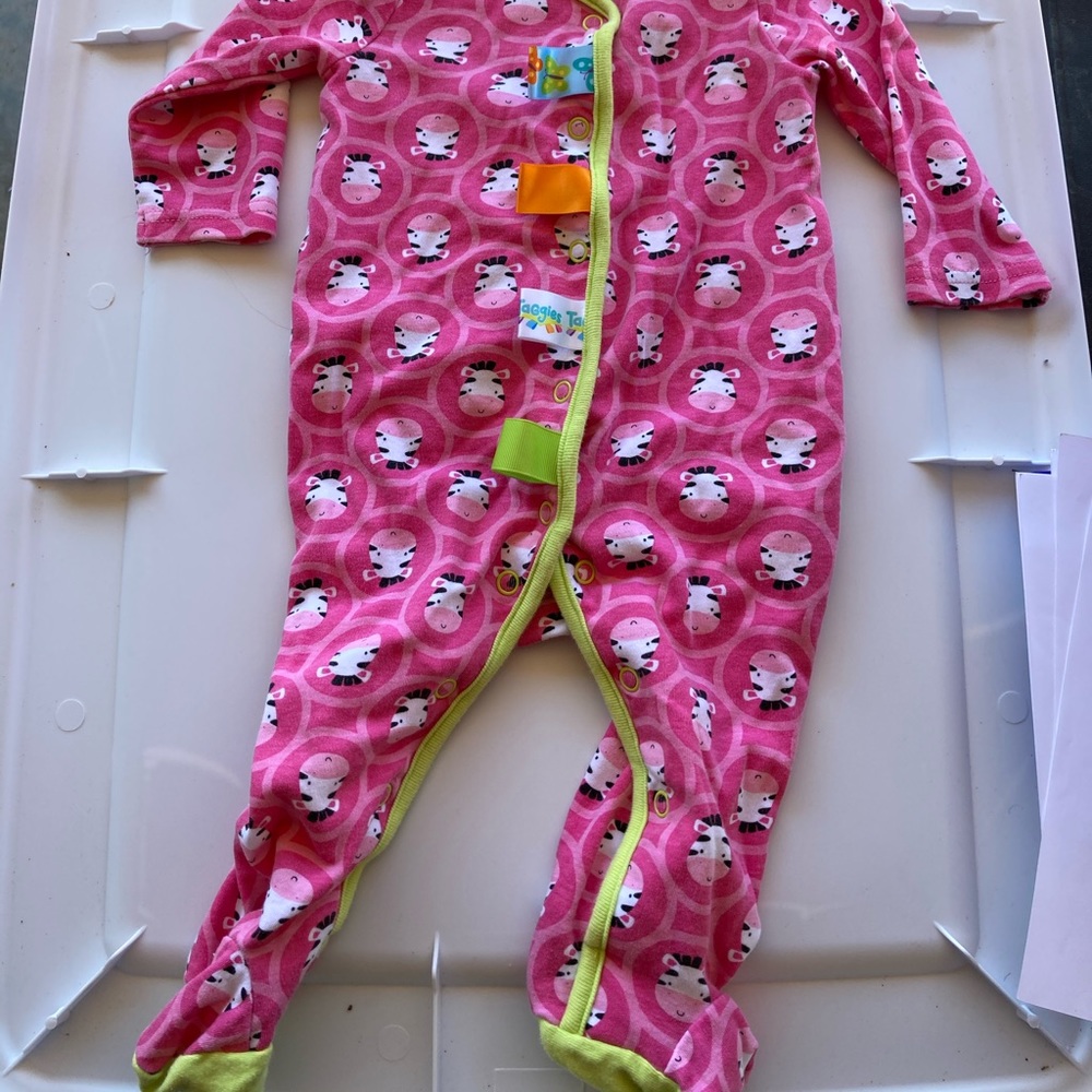 9 month old pink cow with sensory tags